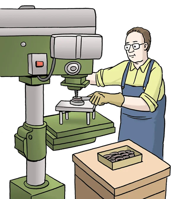 Mann arbeitet an einer Maschine.