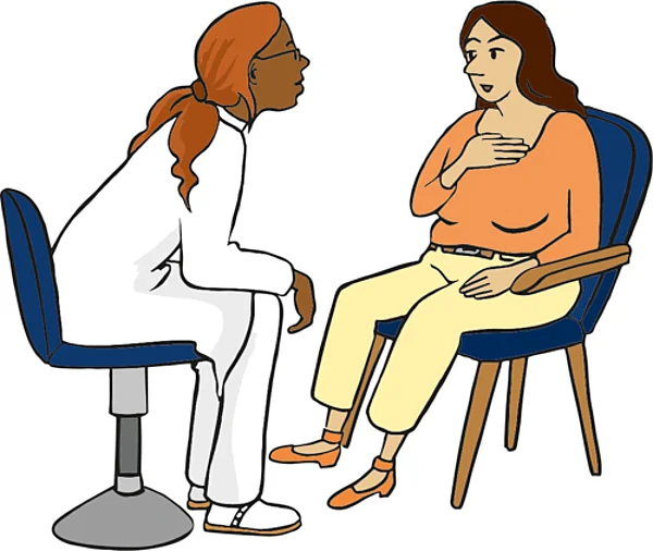 Ärztin im Gespräch mit Patientin.